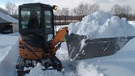 mini excavator snow removal